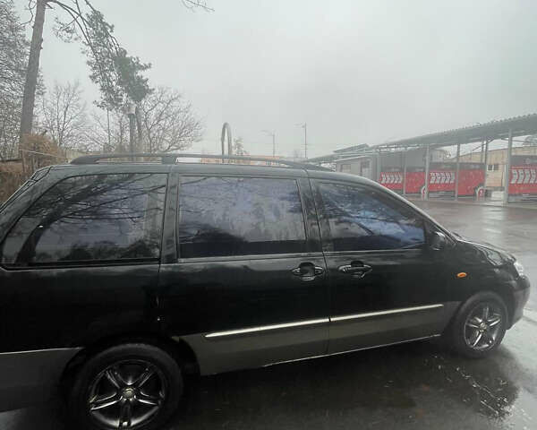 Черный Мазда МПВ, объемом двигателя 0 л и пробегом 600 тыс. км за 2499 $, фото 1 на Automoto.ua