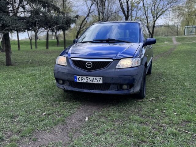 Синій Мазда МПВ, об'ємом двигуна 2 л та пробігом 336 тис. км за 1958 $, фото 1 на Automoto.ua