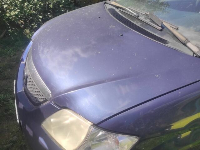 Синій Мазда МПВ, об'ємом двигуна 2 л та пробігом 235 тис. км за 1053 $, фото 1 на Automoto.ua