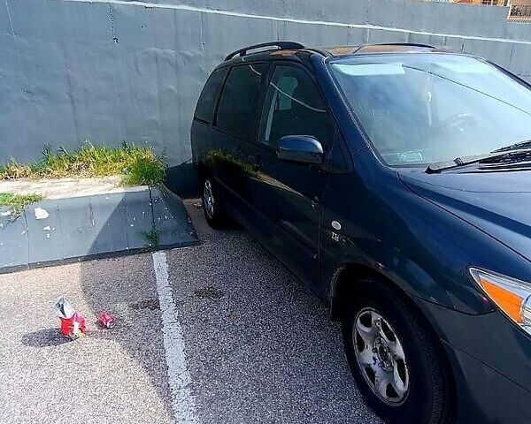 Зеленый Мазда МПВ, объемом двигателя 2 л и пробегом 240 тыс. км за 4500 $, фото 1 на Automoto.ua