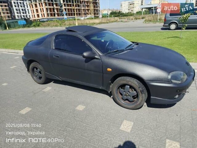 Чорний Мазда МХ-3, об'ємом двигуна 1.6 л та пробігом 196 тис. км за 3000 $, фото 1 на Automoto.ua