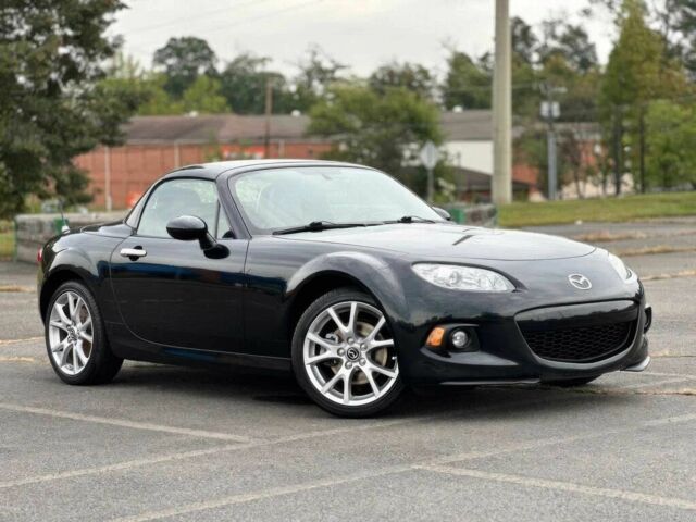 Черный Мазда МХ-5, объемом двигателя 2 л и пробегом 78 тыс. км за 7800 $, фото 1 на Automoto.ua