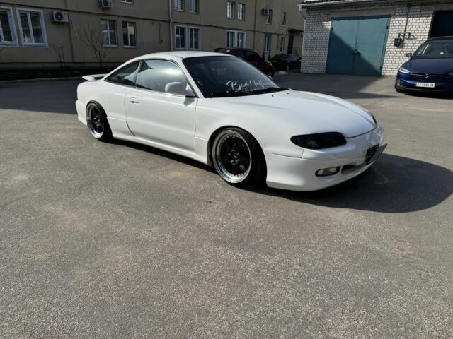 Белый Мазда МХ-6, объемом двигателя 2.5 л и пробегом 1000 тыс. км за 8000 $, фото 1 на Automoto.ua