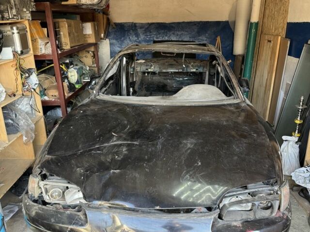 Черный Мазда МХ-6, объемом двигателя 0 л и пробегом 300 тыс. км за 381 $, фото 1 на Automoto.ua