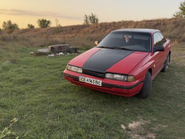 Красный Мазда МХ-6, объемом двигателя 2 л и пробегом 200 тыс. км за 1400 $, фото 1 на Automoto.ua