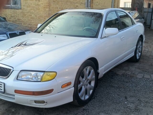 Білий Мазда Мілленія, об'ємом двигуна 2.5 л та пробігом 260 тис. км за 2399 $, фото 1 на Automoto.ua