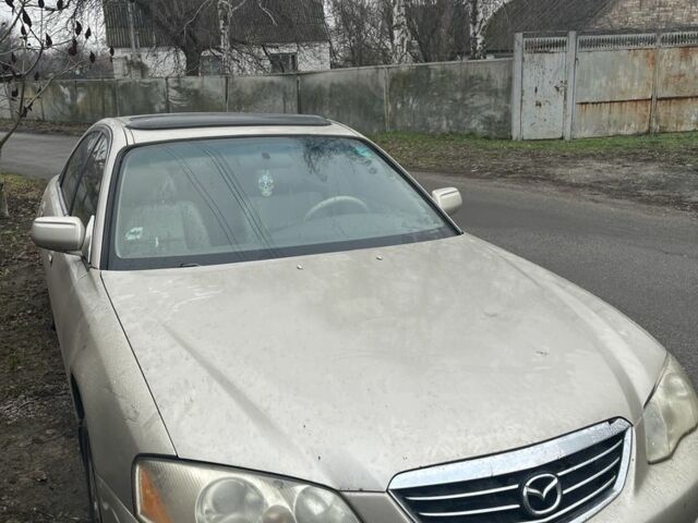 Бежевый Мазда Милления, объемом двигателя 2.5 л и пробегом 197 тыс. км за 2600 $, фото 1 на Automoto.ua