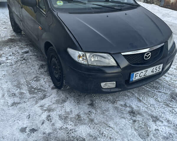 Черный Мазда Премаси, объемом двигателя 1.99 л и пробегом 378 тыс. км за 1400 $, фото 1 на Automoto.ua