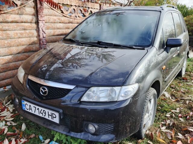 Чорний Мазда Премасі, об'ємом двигуна 1.8 л та пробігом 250 тис. км за 1201 $, фото 1 на Automoto.ua