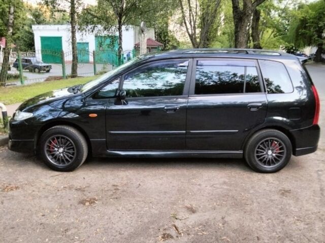 Черный Мазда Премаси, объемом двигателя 2 л и пробегом 353 тыс. км за 3500 $, фото 1 на Automoto.ua