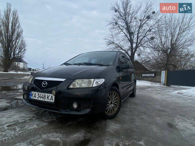 Черный Мазда Премаси, объемом двигателя 2 л и пробегом 300 тыс. км за 2150 $, фото 1 на Automoto.ua