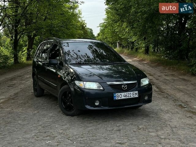 Черный Мазда Премаси, объемом двигателя 1.8 л и пробегом 299 тыс. км за 2500 $, фото 1 на Automoto.ua