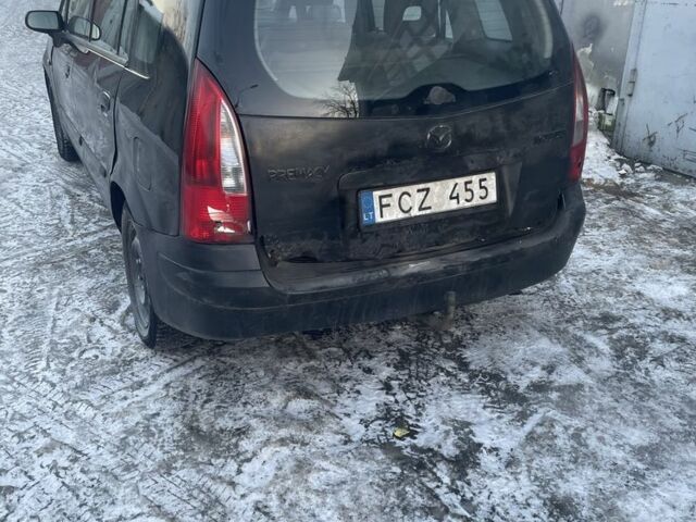 Черный Мазда Премаси, объемом двигателя 2 л и пробегом 378 тыс. км за 1400 $, фото 1 на Automoto.ua