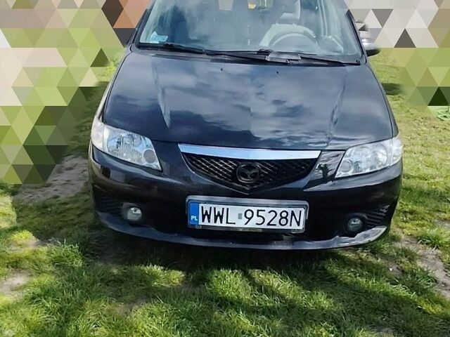 Чорний Мазда Премасі, об'ємом двигуна 2 л та пробігом 230 тис. км за 2150 $, фото 1 на Automoto.ua