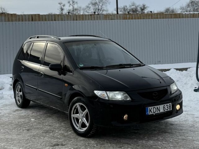 Черный Мазда Премаси, объемом двигателя 2 л и пробегом 240 тыс. км за 1500 $, фото 1 на Automoto.ua