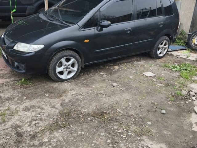 Черный Мазда Премаси, объемом двигателя 0 л и пробегом 200 тыс. км за 2500 $, фото 1 на Automoto.ua