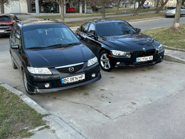 Черный Мазда Премаси, объемом двигателя 1.8 л и пробегом 279 тыс. км за 3500 $, фото 1 на Automoto.ua
