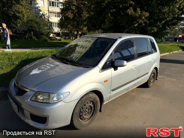 Серый Мазда Премаси, объемом двигателя 2 л и пробегом 258 тыс. км за 950 $, фото 1 на Automoto.ua