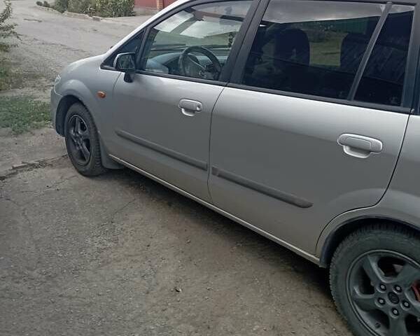 Серый Мазда Премаси, объемом двигателя 2 л и пробегом 200 тыс. км за 3100 $, фото 1 на Automoto.ua
