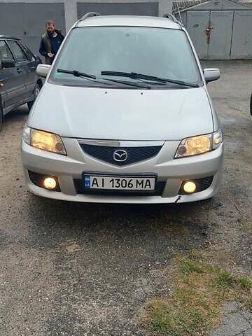 Серый Мазда Премаси, объемом двигателя 2 л и пробегом 250 тыс. км за 2800 $, фото 1 на Automoto.ua