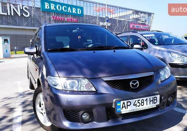 Серый Мазда Премаси, объемом двигателя 1.8 л и пробегом 245 тыс. км за 4500 $, фото 1 на Automoto.ua
