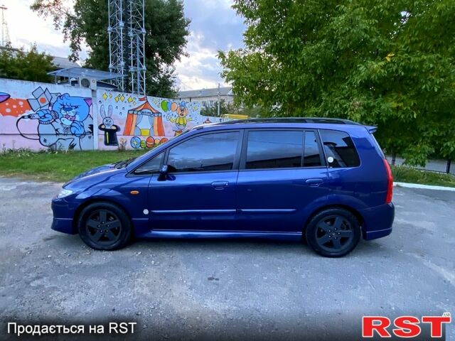 Синий Мазда Премаси, объемом двигателя 2 л и пробегом 113 тыс. км за 4200 $, фото 1 на Automoto.ua