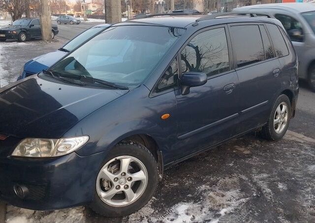 Синий Мазда Премаси, объемом двигателя 2 л и пробегом 264 тыс. км за 1599 $, фото 1 на Automoto.ua