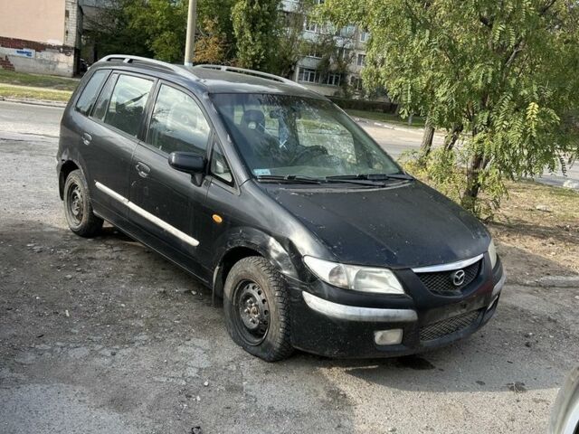 Зеленый Мазда Премаси, объемом двигателя 2 л и пробегом 250 тыс. км за 600 $, фото 1 на Automoto.ua