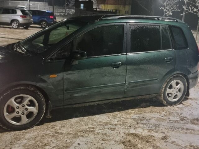 Зеленый Мазда Премаси, объемом двигателя 2 л и пробегом 387 тыс. км за 2600 $, фото 1 на Automoto.ua