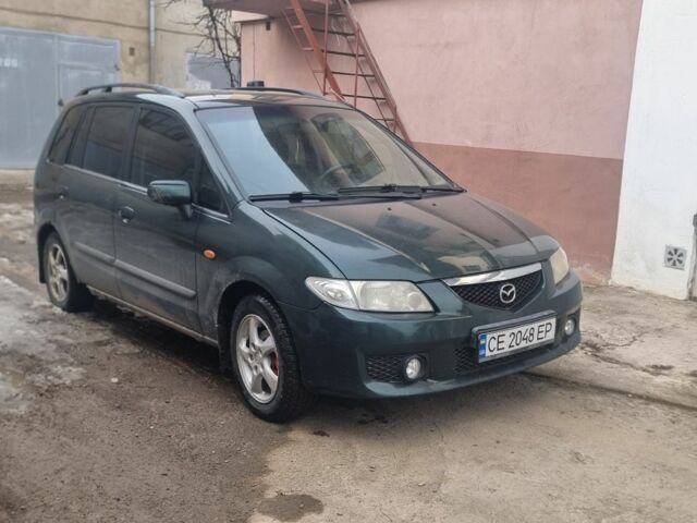 Зелений Мазда Премасі, об'ємом двигуна 2 л та пробігом 390 тис. км за 2000 $, фото 1 на Automoto.ua