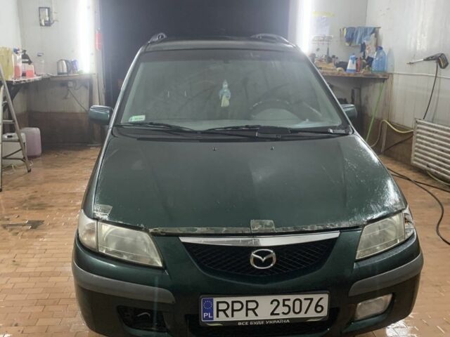 Зеленый Мазда Премаси, объемом двигателя 2 л и пробегом 250 тыс. км за 900 $, фото 1 на Automoto.ua