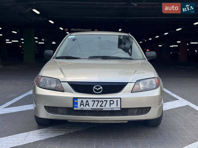 Серый Мазда Протеж, объемом двигателя 2 л и пробегом 85 тыс. км за 3200 $, фото 1 на Automoto.ua