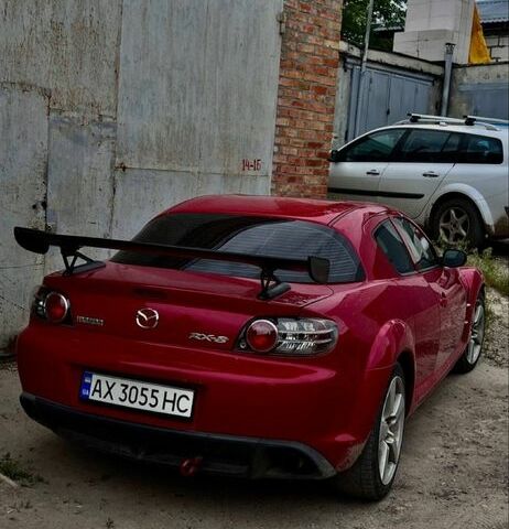 Красный Мазда РХ-8, объемом двигателя 2.6 л и пробегом 57 тыс. км за 6000 $, фото 1 на Automoto.ua