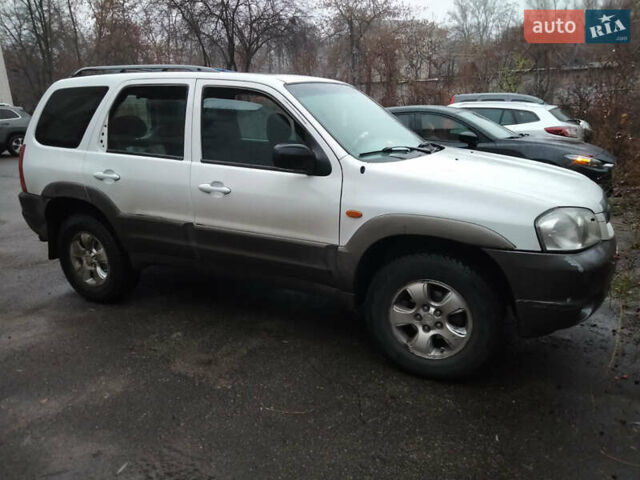 Білий Мазда Трибьют, об'ємом двигуна 2.97 л та пробігом 200 тис. км за 6000 $, фото 1 на Automoto.ua