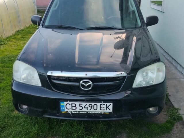 Чорний Мазда Трибьют, об'ємом двигуна 2 л та пробігом 300 тис. км за 3364 $, фото 1 на Automoto.ua