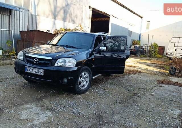 Чорний Мазда Трибьют, об'ємом двигуна 2 л та пробігом 267 тис. км за 4800 $, фото 1 на Automoto.ua