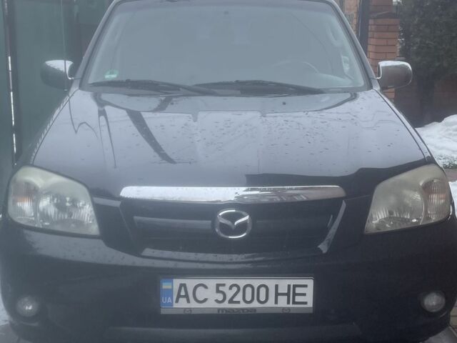 Черный Мазда Трибьют, объемом двигателя 2.3 л и пробегом 187 тыс. км за 4500 $, фото 1 на Automoto.ua
