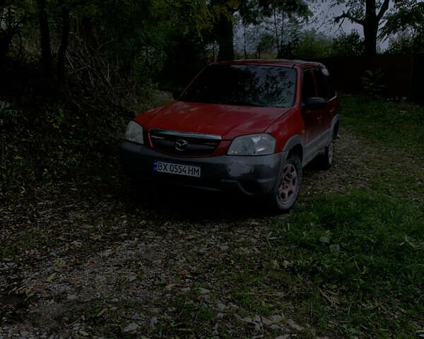 Красный Мазда Трибьют, объемом двигателя 1.99 л и пробегом 460 тыс. км за 4550 $, фото 1 на Automoto.ua