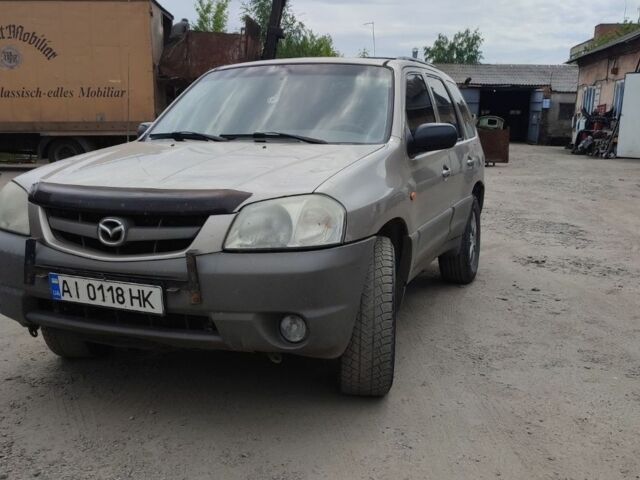 Сірий Мазда Трибьют, об'ємом двигуна 2 л та пробігом 307 тис. км за 2700 $, фото 1 на Automoto.ua