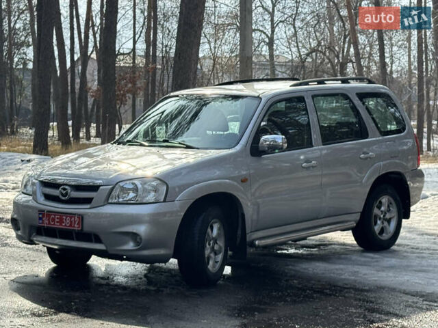 Серый Мазда Трибьют, объемом двигателя 2.3 л и пробегом 208 тыс. км за 5800 $, фото 1 на Automoto.ua