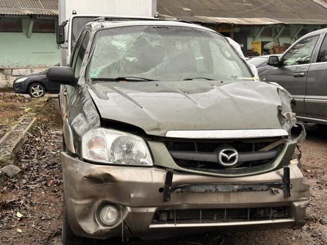 Зеленый Мазда Трибьют, объемом двигателя 3 л и пробегом 219 тыс. км за 2000 $, фото 1 на Automoto.ua