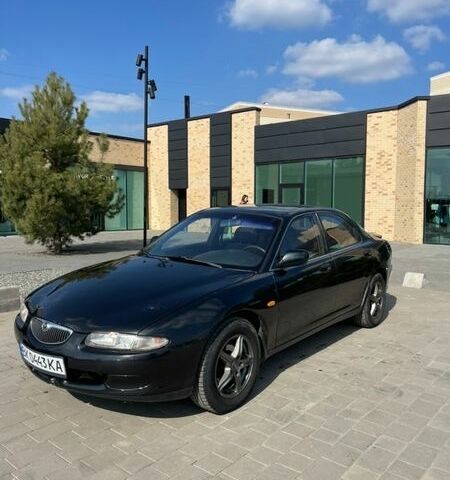 Черный Мазда Кседос 6, объемом двигателя 2 л и пробегом 450 тыс. км за 1450 $, фото 1 на Automoto.ua