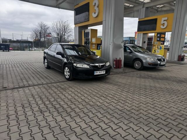 Черный Мазда Кседос 6, объемом двигателя 1.8 л и пробегом 230 тыс. км за 2200 $, фото 1 на Automoto.ua