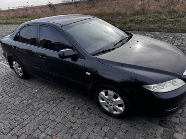 Черный Мазда Кседос 6, объемом двигателя 0 л и пробегом 230 тыс. км за 2200 $, фото 1 на Automoto.ua