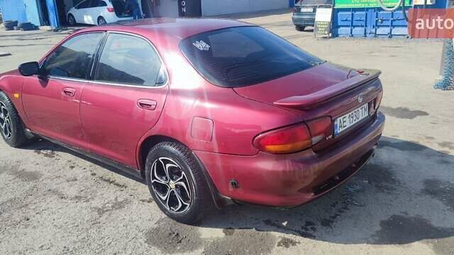 Червоний Мазда Кседос 6, об'ємом двигуна 2 л та пробігом 422 тис. км за 2300 $, фото 1 на Automoto.ua