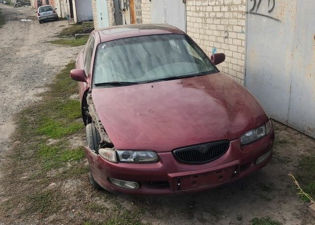 Красный Мазда Кседос 6, объемом двигателя 2 л и пробегом 424 тыс. км за 700 $, фото 1 на Automoto.ua