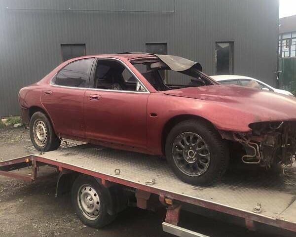 Красный Мазда Кседос 6, объемом двигателя 2 л и пробегом 100 тыс. км за 1000 $, фото 1 на Automoto.ua