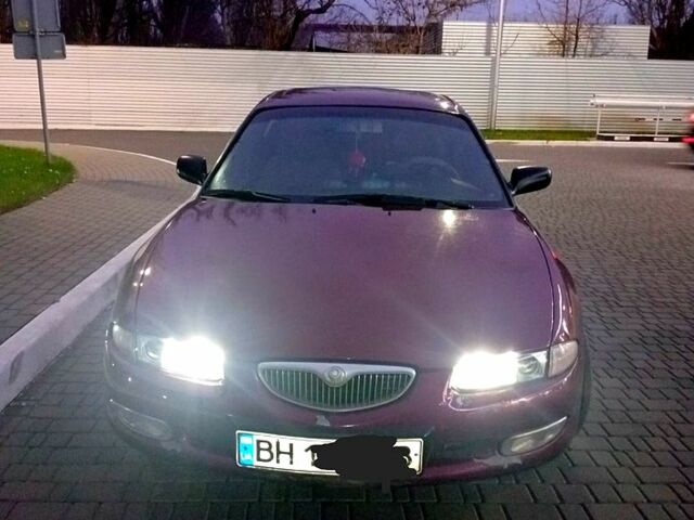 Красный Мазда Кседос 6, объемом двигателя 1.6 л и пробегом 265 тыс. км за 2500 $, фото 1 на Automoto.ua