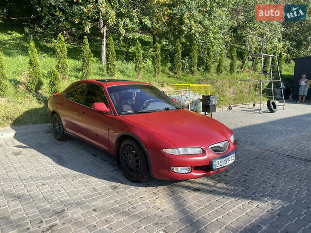 Червоний Мазда Кседос 6, об'ємом двигуна 2 л та пробігом 300 тис. км за 2200 $, фото 1 на Automoto.ua
