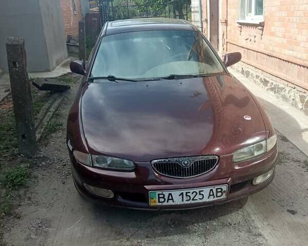 Красный Мазда Кседос 6, объемом двигателя 2 л и пробегом 320 тыс. км за 1500 $, фото 1 на Automoto.ua